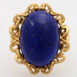 Damenring mit Lapislazuli-Cabochon von ca. 17,7 x 12,8 mm, GG 18K, RW 58, 2. H. 20. Jh., Stein