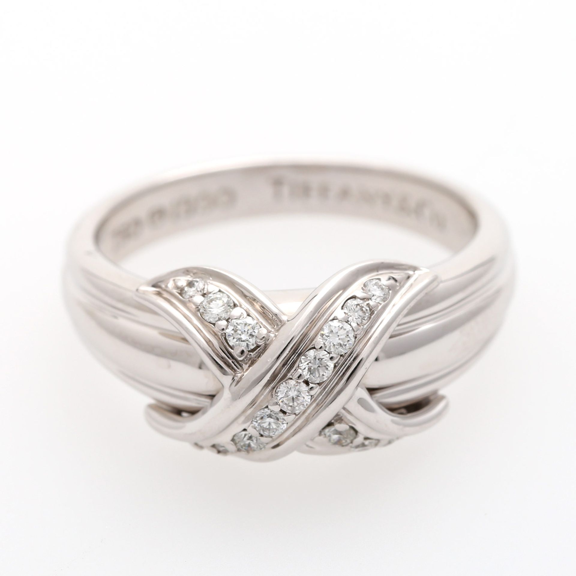 TIFFANY & Co. Ring "Paloma Picasso" 15 Brill. zus. ca. 0,2 ct., FW (F-G)/ VS - SI, WG 18K, RW: 54/