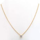 Collier besetzt mit 1 Brillant ca. 1,15 ct, LGW (J)/ SI. GG 18K. Rundankerkette Länge ca. 45,5 cm. *