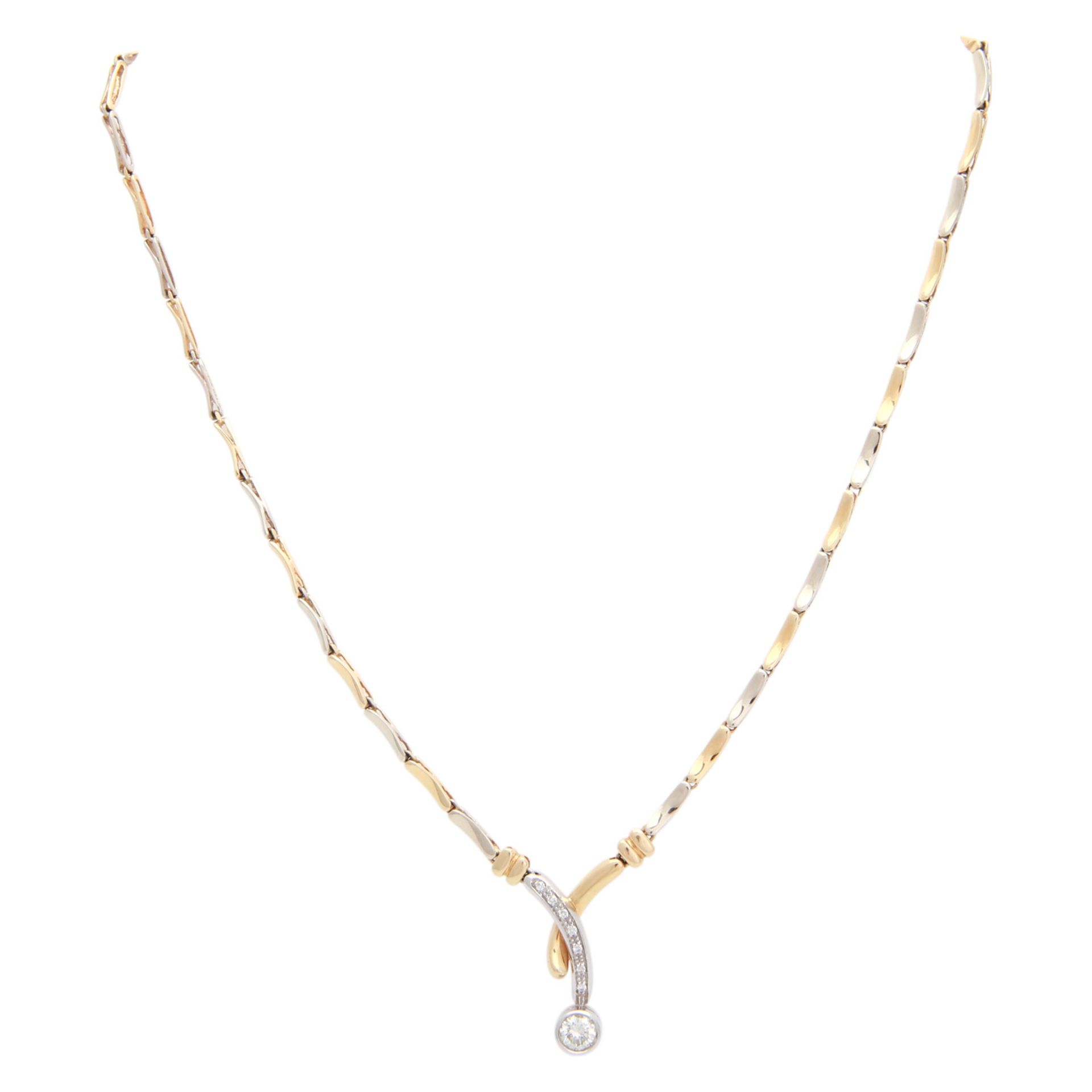 Goldcollier mit Diamanten, zentral 1 Brillant von ca. 0,6 ct., SI, GW (K - L), 7 kleine Diamanten im