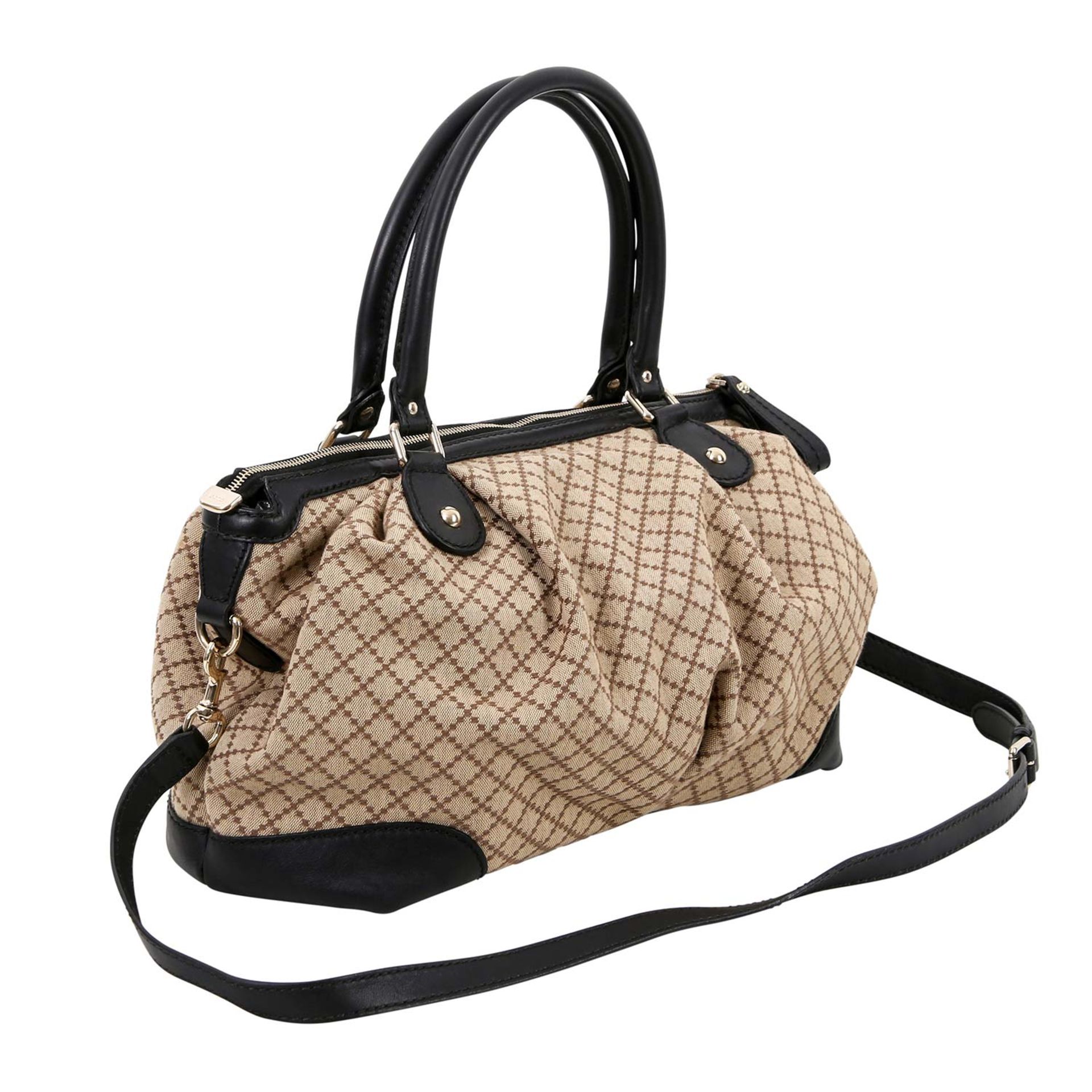 GUCCI Henkeltasche. Modell aus Textil in Beige mit brauner Bestickung und schwarzen Lederdetails. - Image 2 of 6