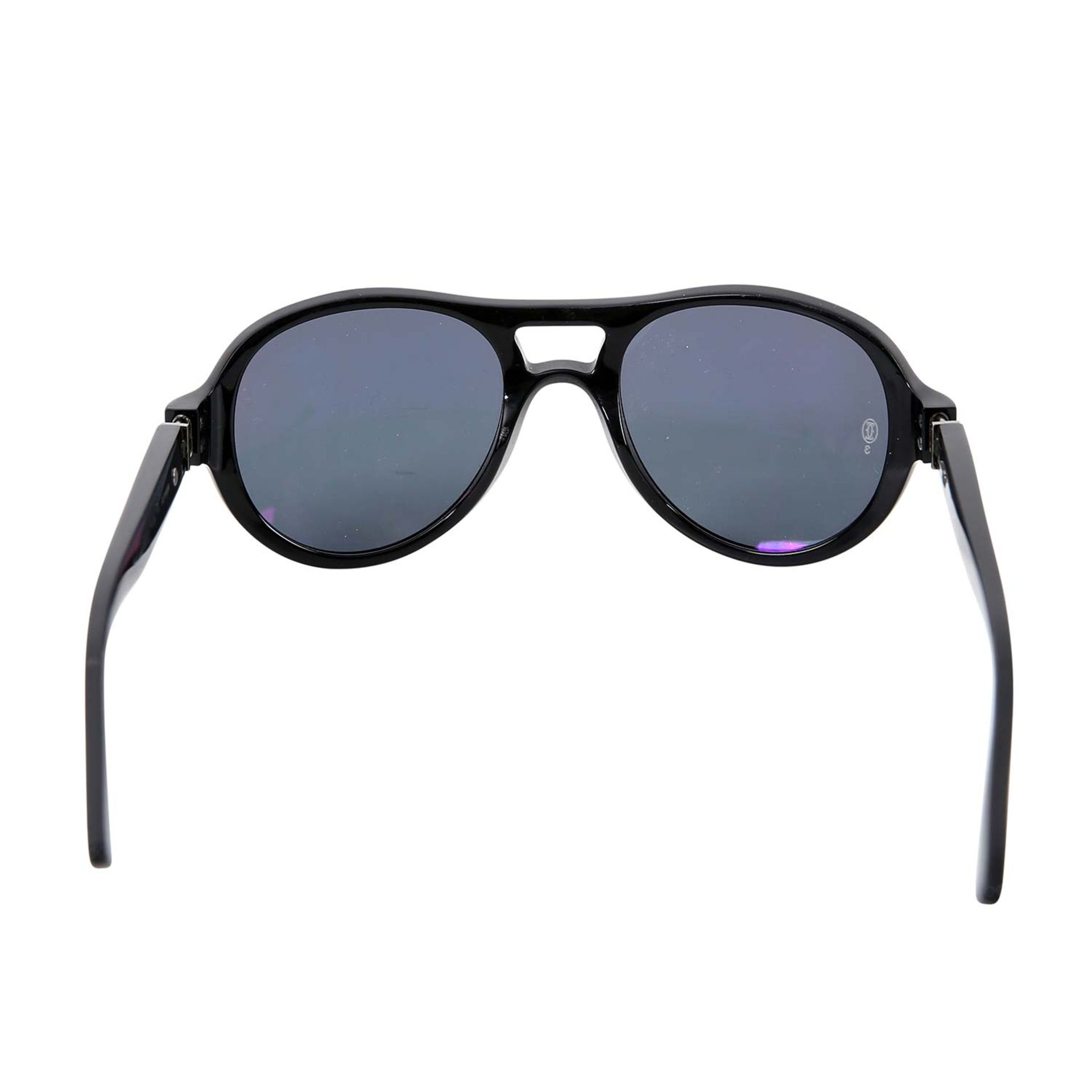 CARTIER Sonnenbrille. Kunststoffgestell in Schwarz, im Verlauf getönte Gläser, doppelter - Image 4 of 4