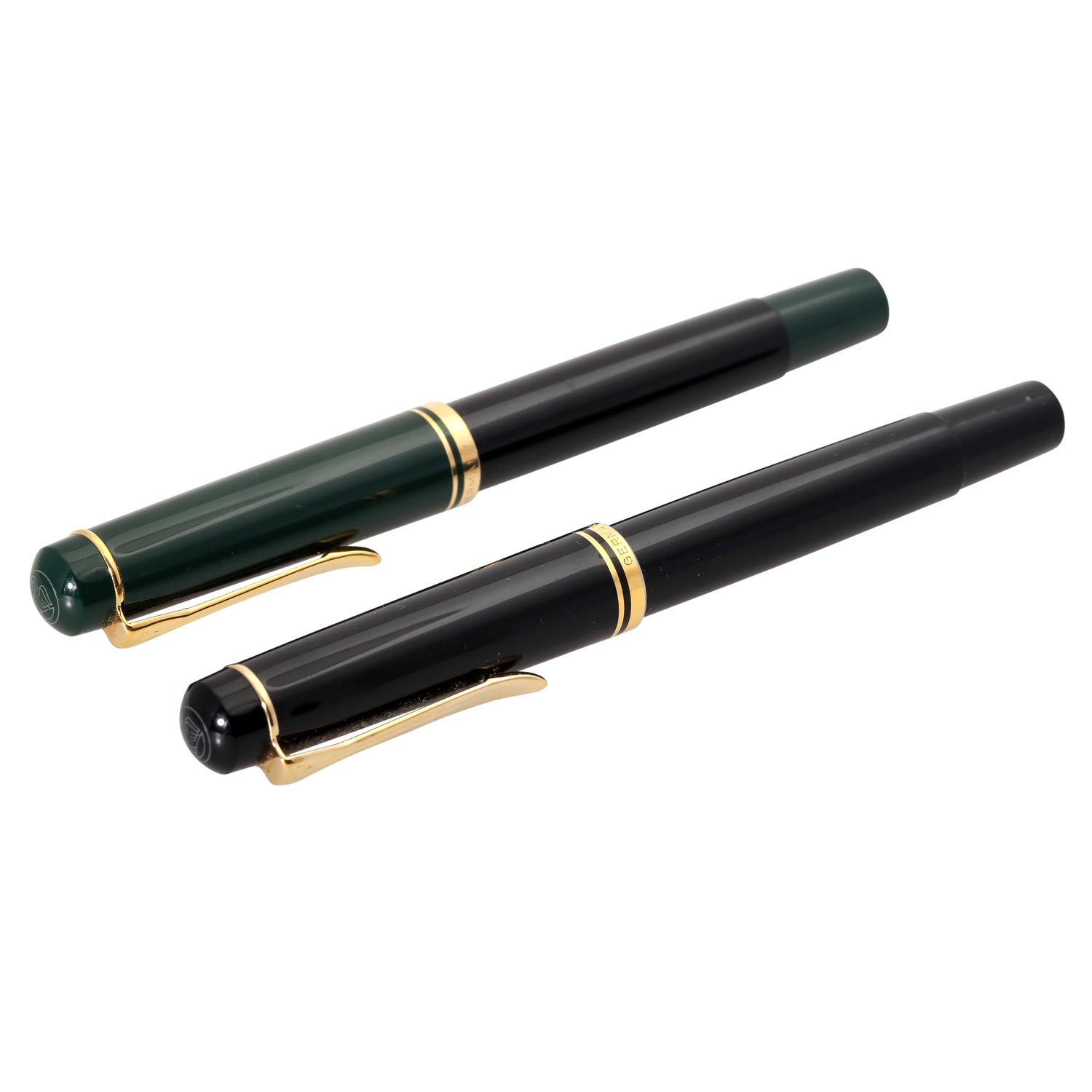 PELIKAN Konvolut, bestehend aus zwei Rollerball.Schwarz bzw. schwarz/grün. Alters- u.