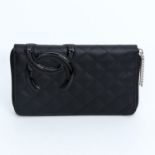 CHANEL extravagantes Portemonnaie. Koll.: 2012 NP.: ca. 700. Schwarzes Leder in Rautensteppung