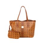 MCM Wende-Shopper "LIZ", akt. NP.: 625,-€.Visetos Canvas Serie in Cognacfarben mit schwarzem Logo-