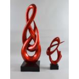 Two 20th century abstract sculptures red lacquered sculpture 77cm and 37cm