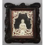 German white metal relief plaque of an old lady wearing a bonnet framed by scrollwork decoration and