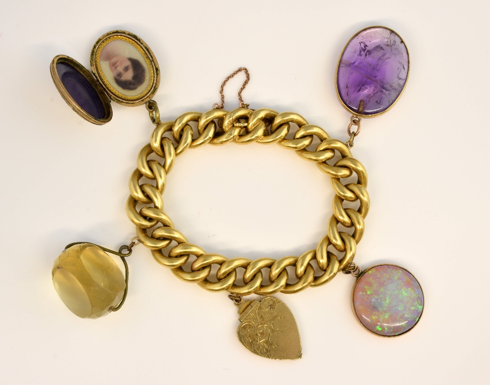 Victorian gold curb link chain bracelet, with a number of pendants, cabochon opal, gold heart
