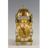 20th century brass lantern clock of typical form, French movement, English case, 29cm high.