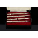 Cased set of four bridge pencils marked sterling.