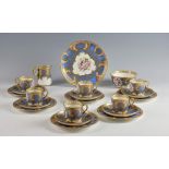 Royal Worcester tea service painted with flowers within sky blue borders comprising 6 cups, 6