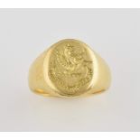 Gold signet ring, the impressed heraldic crest depicting a dragon, 18 ct gold . good condition minor