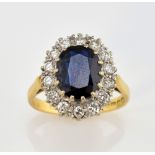 Vintage sapphire and diamond cluster ring, oval cut sapphire, estimated weight 2.68 carats,