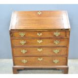 19th century mahogany bureau with a fitted interior above four graduated drawers, on bracket base,