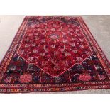 Persian Blue Ground Carpet, multiple borders, centre with repeating foliate forms, 222 x 300 cm .