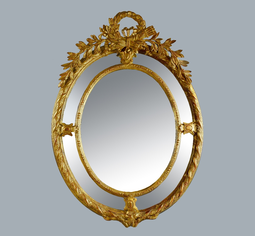 Early 20th century gilt gesso oval wall mirror 123cm x 86cm .