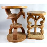 Two small African tables, with carved bases in the form of a bird and tribal animals, the larger