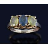 Three stone chrysoberyl and Alexandrite ring, with small diamonds set shoulders, ring size H, .