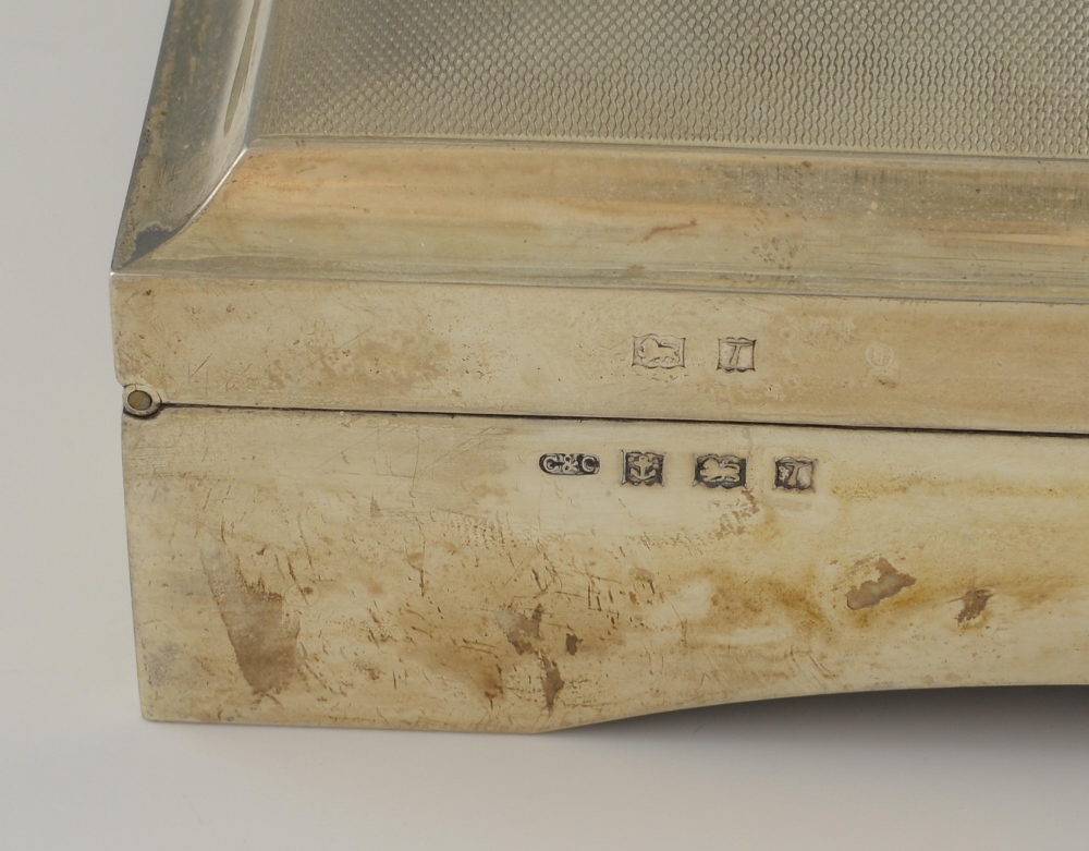 Modern silver cigarette box with engine turned decoration on four feet, by Cohen & Charles, - Image 6 of 8