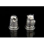 Novelty silver owl and cat salt and pepper pots, max 3.5 cms high.