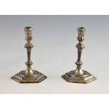 Pair of modern silver miniature candlesticks with knopped stems on hexagonal bases, by Spink &