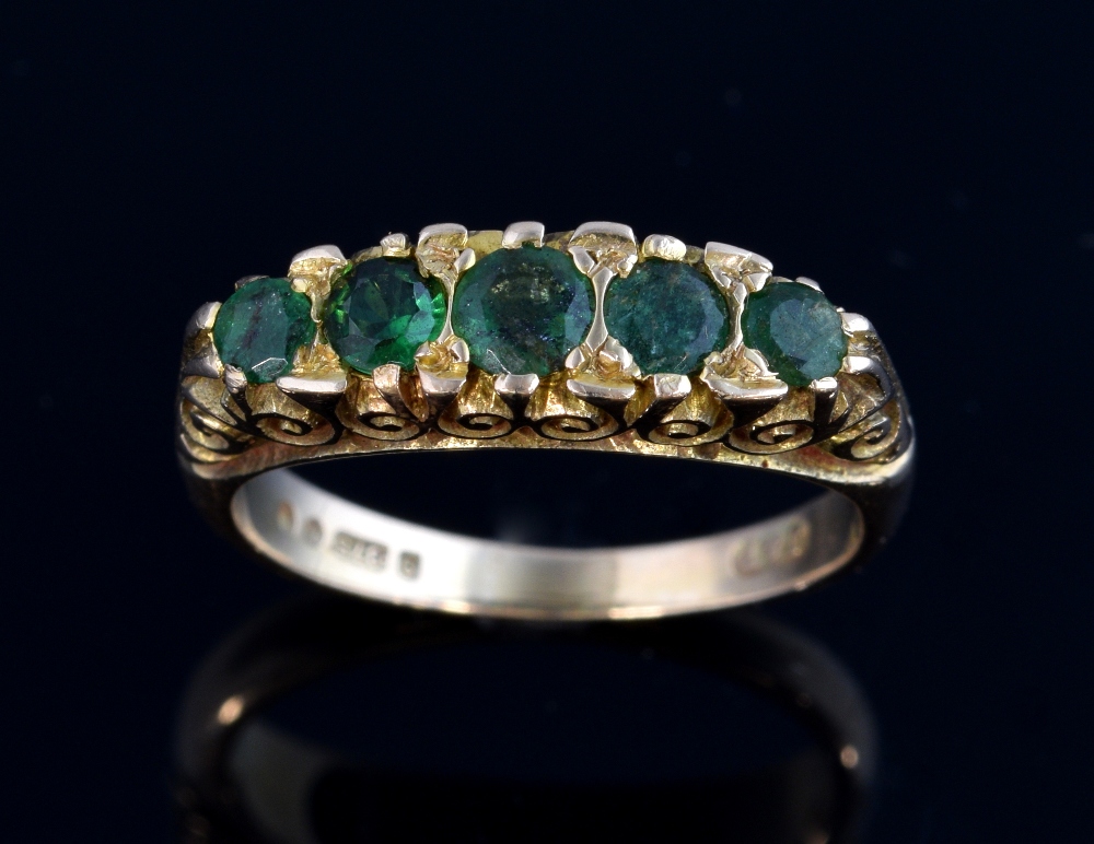 Victorian style ring set with five emeralds, 9 ct gold London 1989, ring size J 1/2 . Gross weight