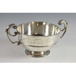 Edward VII silver twin-handled presentation bowl, on round foot, maker's mark rubbed, London,