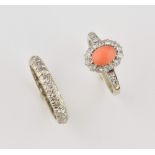 Vintage coral and diamond ring, oval cabochon cut coral, estimated weight 0.69 carat, set with in