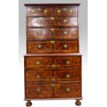 19th Century figured walnut chest on chest, the upper section with two short over three long drawers