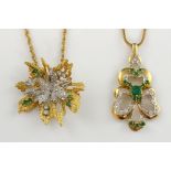 Two emerald and diamond pendants, vintage pendant brooch, with six round cut emeralds, with five