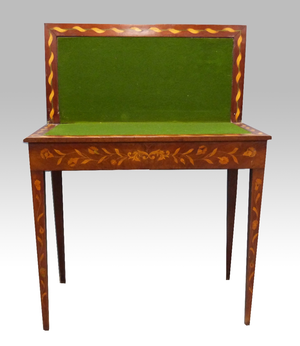 19th century Dutch mahogany and marquerty inlaid folding card table, on square tapering legs, 73cm x