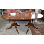 19th century mahogany dining table on twin pillar supports and splayed legs, with one leaf, 170cm