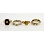 Four gold rings, including two signet rings, one with rectangular cut onyx and centrally set