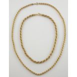 Two gold rope chains, one yellow gold entwined with fine white gold, 18 ct and a 14 ct chain . 18 ct