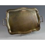 George V silver twin-handled tray of serpentine form, by William Adams Ltd., Birmingham, 1932, 83oz,