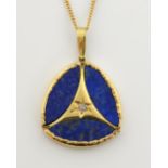 Lapis Lazuli and diamond pendant, round cut diamond, with three marquise shaped plaques, set in 18ct