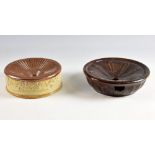 19th century stoneware spittoon, 19cm, and another with treacle glaze. 23cm.