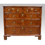 18th century style burr walnut and herringbone crossbanded chest of two short on three long drawers,