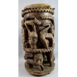 Large African conga drum, possibly Ashanti from Kumasi Ghana, the body carved with figures, snakes