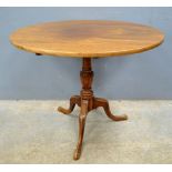 George III mahogany tilt-top table on turned column, trefoil base and pad feet, 73cm high, 85cm