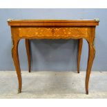 20th century mahogany and marquetry inlaid folding card table with gilt metal mounts , 75cm x 80cm .