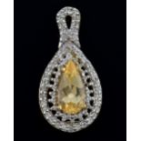 Yellow topaz and diamond pendant with pear shaped stone of 1.2 carats in openwork mount with small