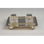 Victorian silver desk stand with twin pen trays and inkwell, moulded beaded and scroll border on