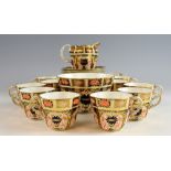 Crown Derby Imari pattern part tea service comprising cream jug, sugar bowl, eleven cups and