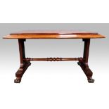 19th century mahogany library table on twin end supports united by a stretcher, 80 x 140 .