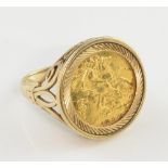 Gold ring set with Elizabeth II 1982 half Sovereign, in 9ct , ring size V . Gross weight 9.3 grams