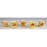 Five Royal Worcester miniature blush ivory loving cups and mugs, earliest 1902, tallest 4cm, (5), .