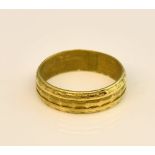 Textured wedding band, 5.7mm wide, 22ct yellow gold hallmarked London 1968, internal engraving, ring