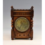 Early 20th century walnut two train mantel clock, 30 x 20 cm.