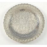 Middle Eastern, possibly Egyptian silver dish with engraved decoration of interlocking forms and